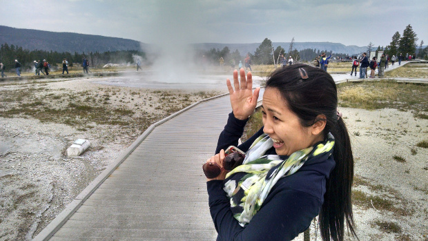 Yuko being rained on by a geyser.